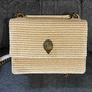 Small Kurt Geiger raffia crossbody. Bag has never been used. Color cream.